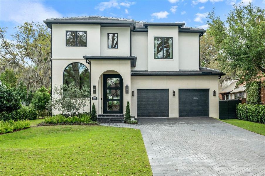 Front exterior of a new home in , Winter Park, FL, highlighting curb appeal (Image 25).