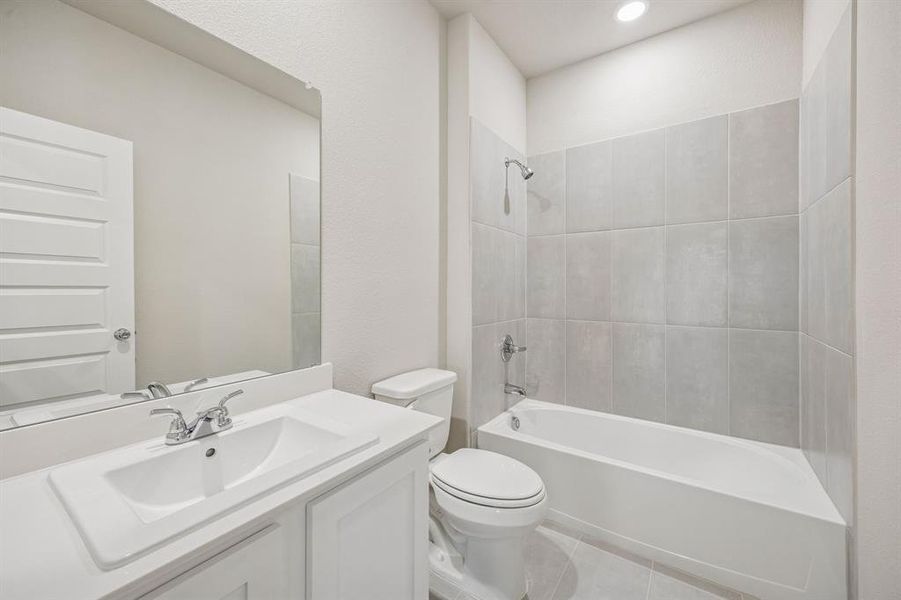 Bathroom in the Wimbledon home plan by Trophy Signature Homes – REPRESENTATIVE PHOTO Bathroom in the Wimbledon home plan by Trophy Signature Homes – REPRESENTATIVE PHOTO