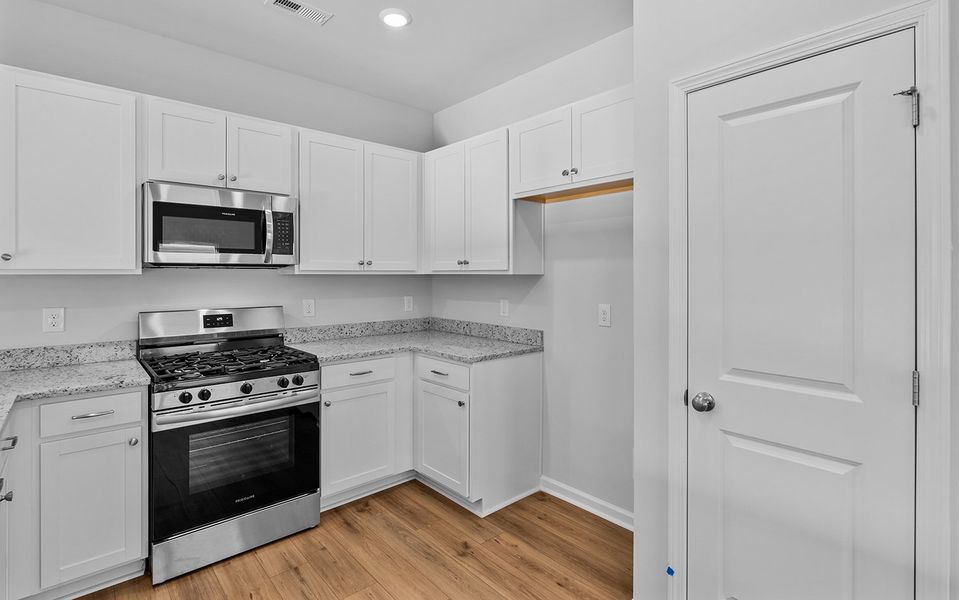 Furnished interior view inside a new home in Hanes Lake, Winston-Salem (Image 15). Furnished interior view inside a new home in Hanes Lake, Winston-Salem (Image 15).