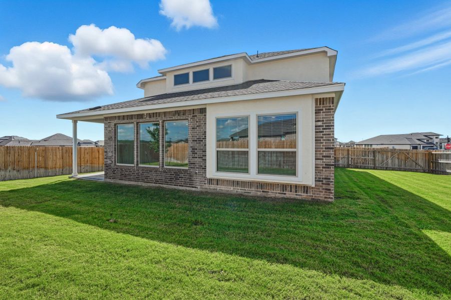 Exterior details and patio area of a home in Alsatian Oaks, Castroville (Image 28).