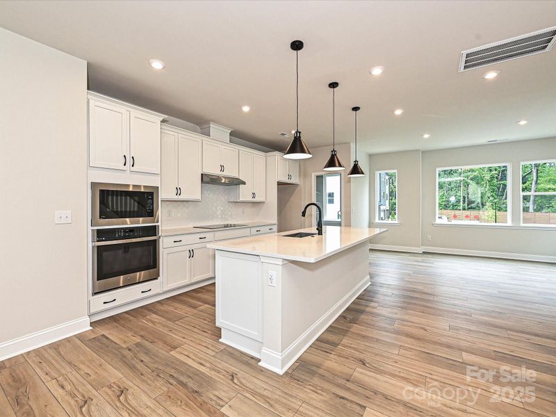 Gourmet Kitchen Layout with Stunning Designer Selected Finishes.