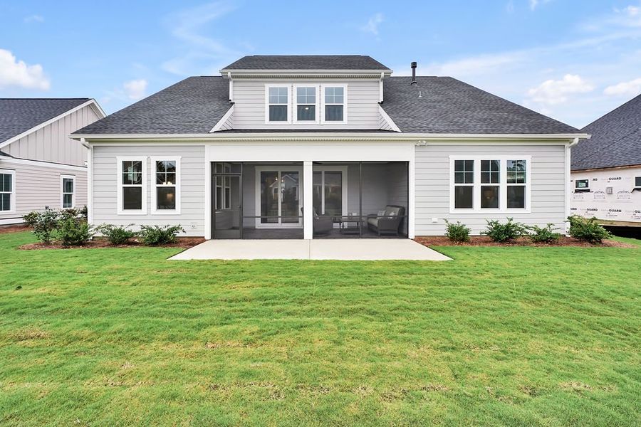 Exterior details and patio area of a home in Brunswick Forest, Leland (Image 21).