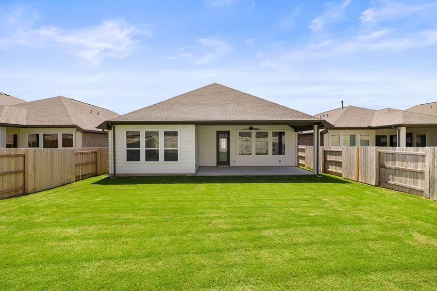 Front exterior of a new home in Park Collection at Lariat, Liberty Hill, TX, highlighting curb appeal (Image 2). Front exterior of a new home in Park Collection at Lariat, Liberty Hill, TX, highlighting curb appeal (Image 2).