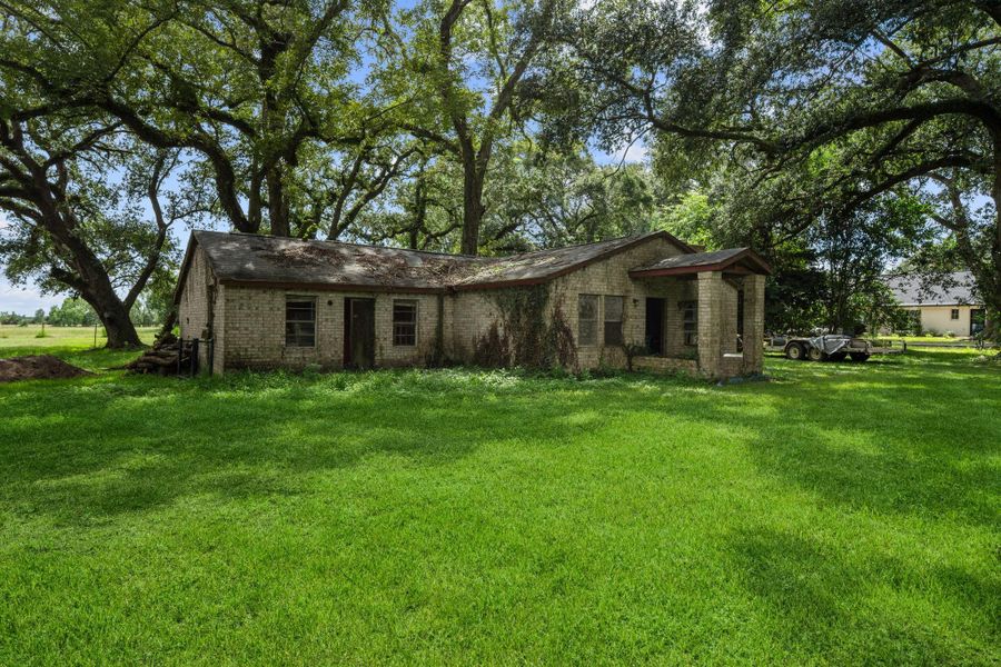 Front exterior of a new home in , Anahuac, TX, highlighting curb appeal (Image 19).