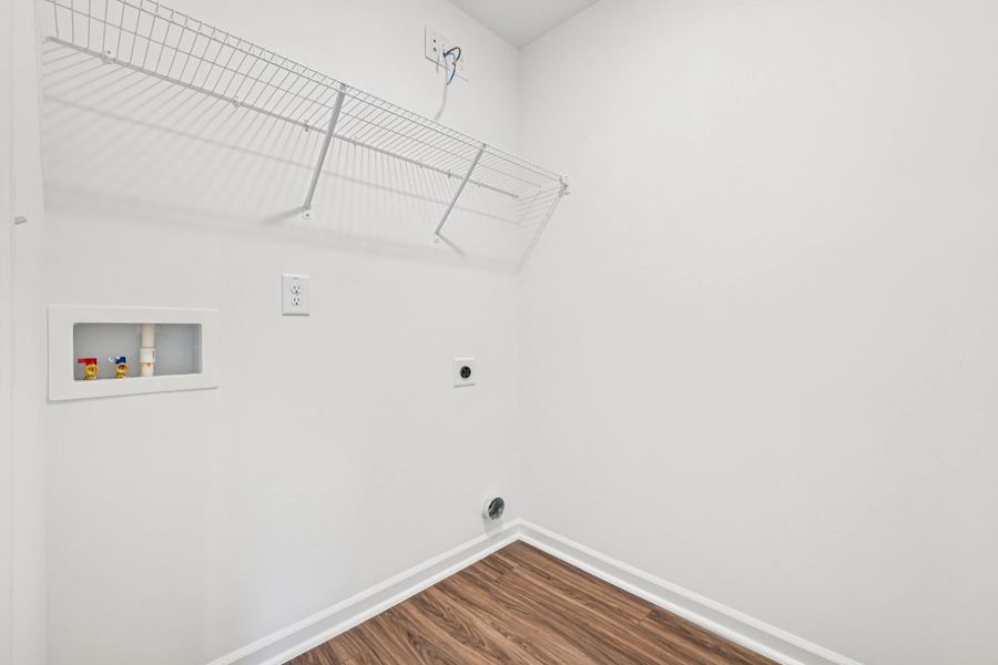 Laundry Room - Functional with flair, featuring sleek shelving.