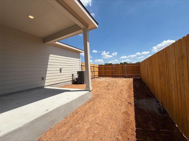Exterior details and patio area of a home in Creeks Crossing, Elgin (Image 3).