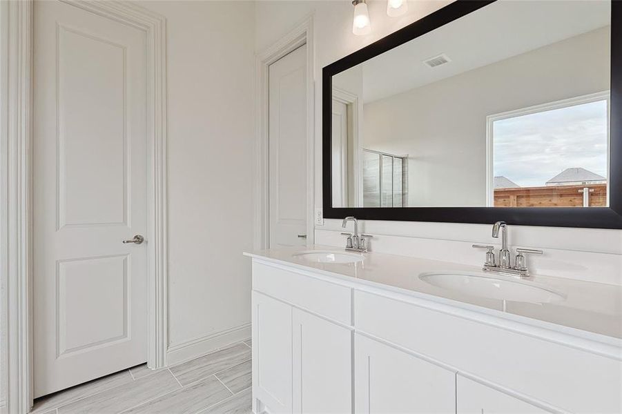 Bathroom featuring vanity