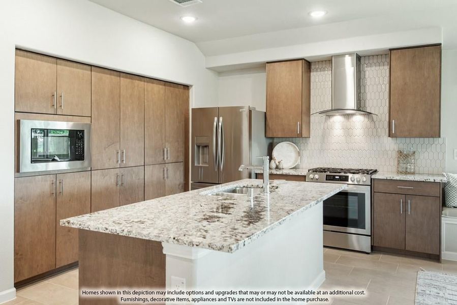Kitchen with wood cabinets, granite island, stainless steel appliances, and hexagon tile backsplash