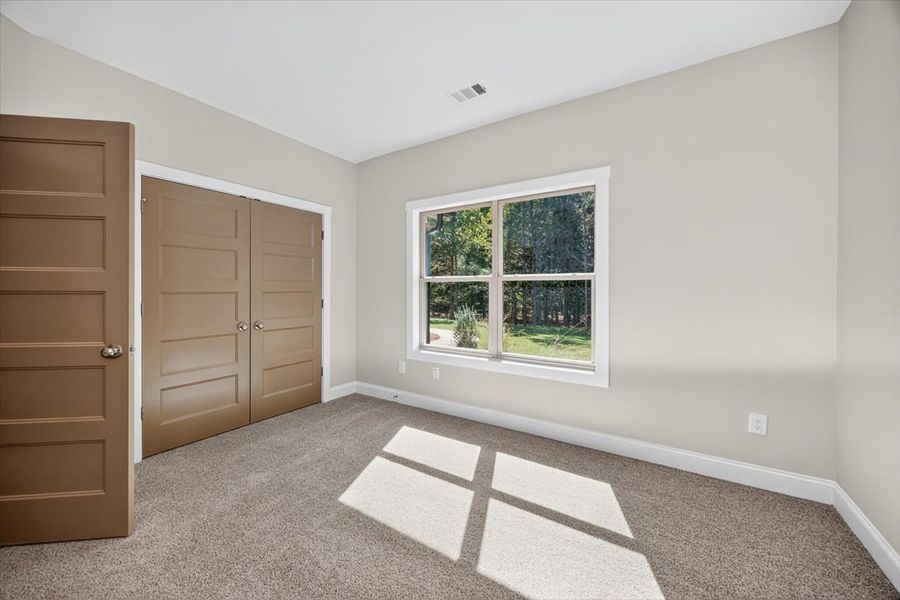 Spacious, unfurnished interior of a new home in White Oaks, The Rock (Image 27).