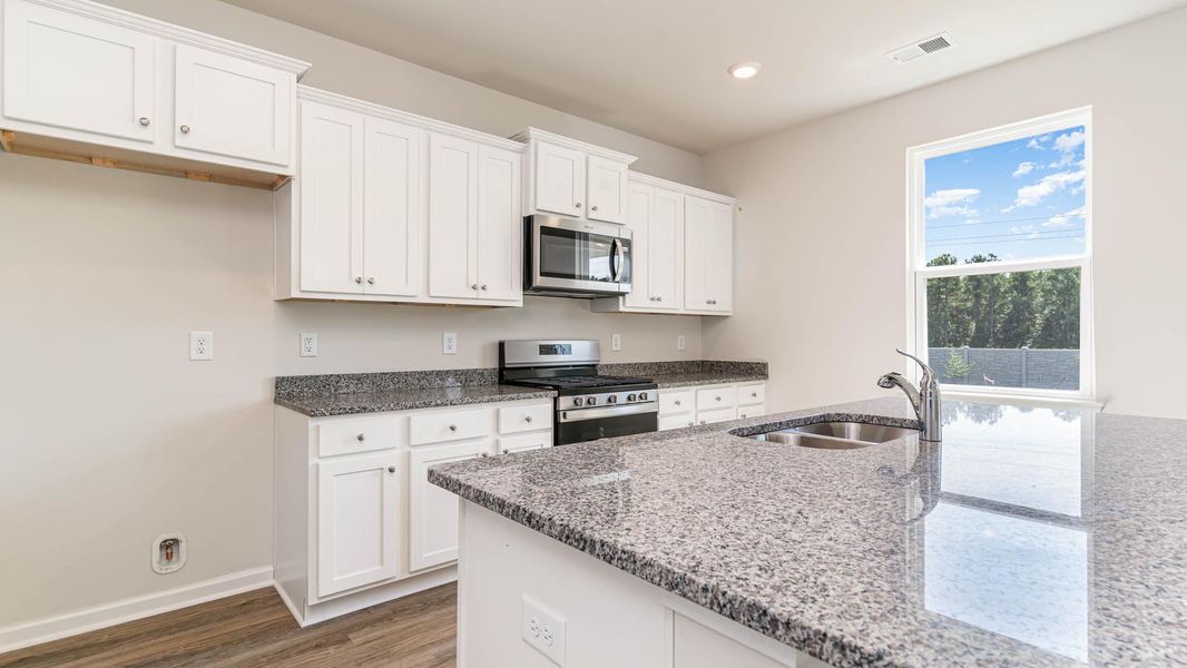 Furnished interior view inside a new home in The Bluffs at Mill Creek, Florence (Image 8). Furnished interior view inside a new home in The Bluffs at Mill Creek, Florence (Image 8).