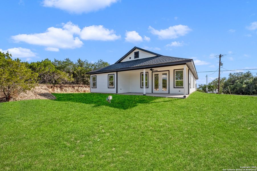 Front exterior of a new home in , Canyon Lake, TX, highlighting curb appeal (Image 2). Front exterior of a new home in , Canyon Lake, TX, highlighting curb appeal (Image 2).
