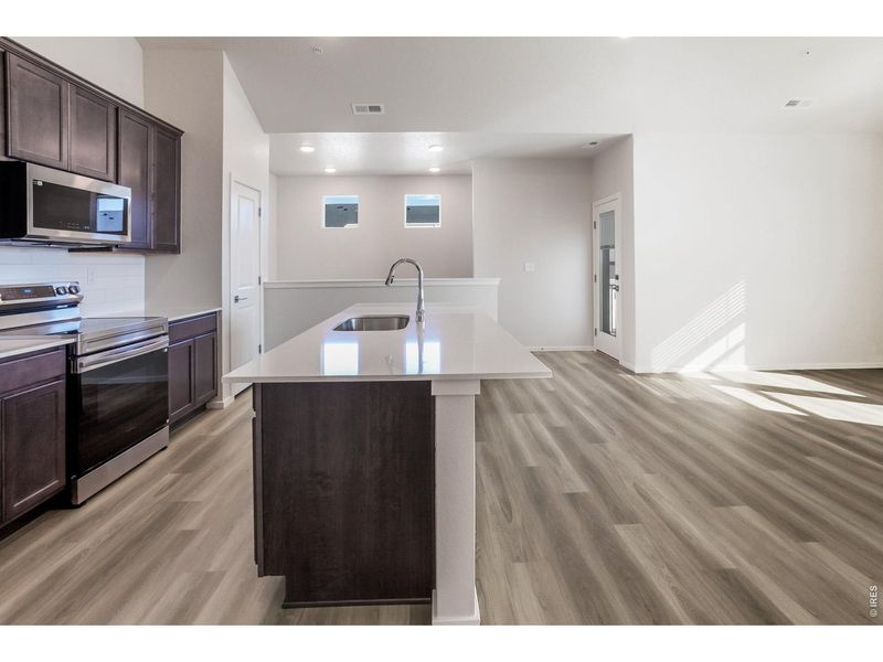 Furnished interior view inside a new home in Raindance Condos, Windsor (Image 8).