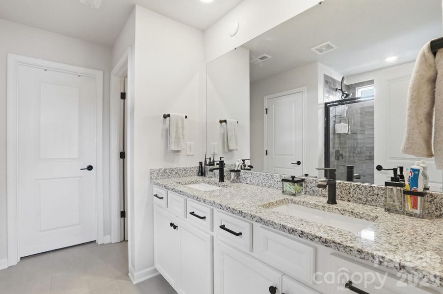 Furnished interior view inside a new home in , Charlotte (Image 31).