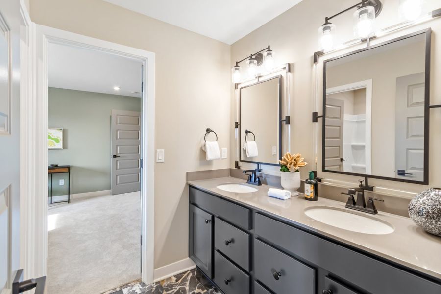 Representative furnished interior of a home built from the Huxley by Fischer Homes in Veranda Manor, Canton (Image 40).