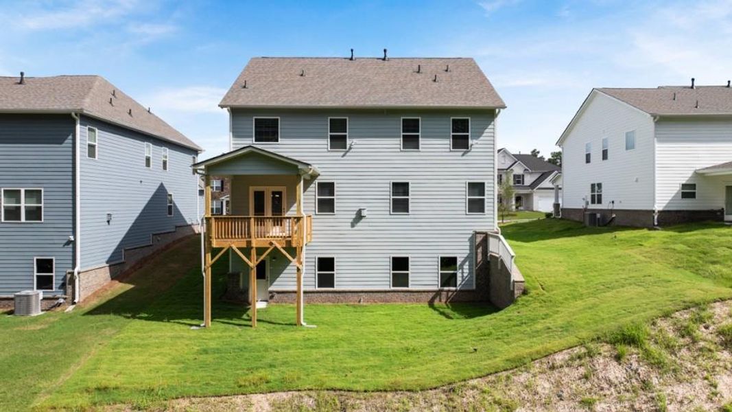 Front exterior of a new home in Butner Estates, South Fulton, GA, highlighting curb appeal (Image 2).