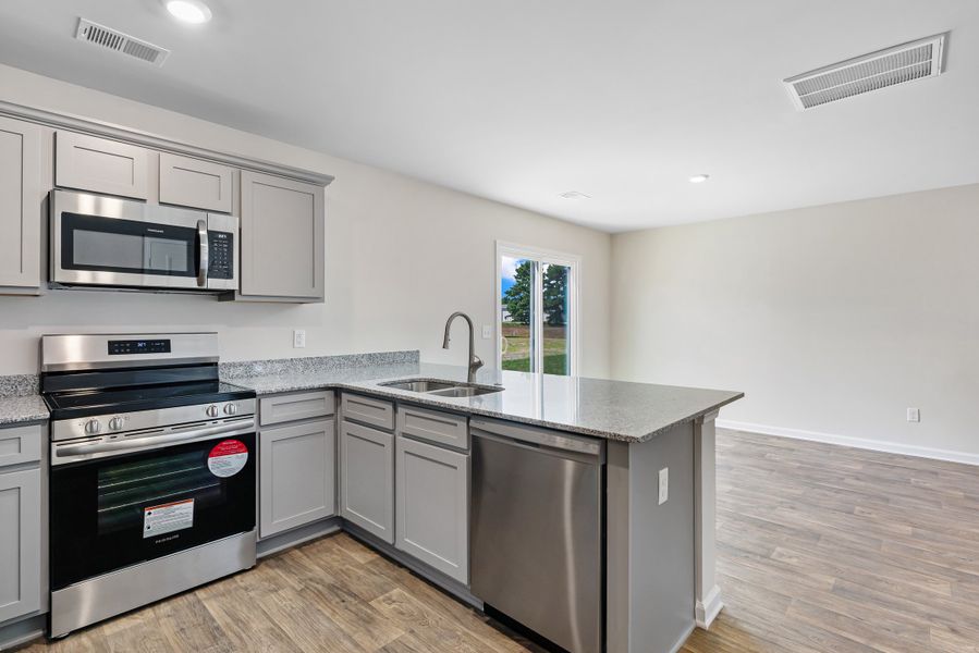 Representative furnished interior of a home built from the Poplar B by McGuinn Homes in Reserve at Mill Creek, Columbia (Image 19).