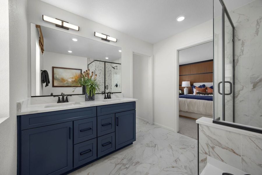 Dual-sink vanity at primary bathroom