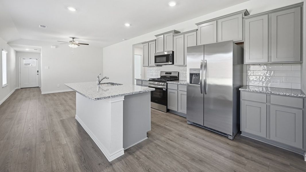 Representative furnished interior of a home built from the Bailey by D.R. Horton in Windchime, Celina (Image 5).