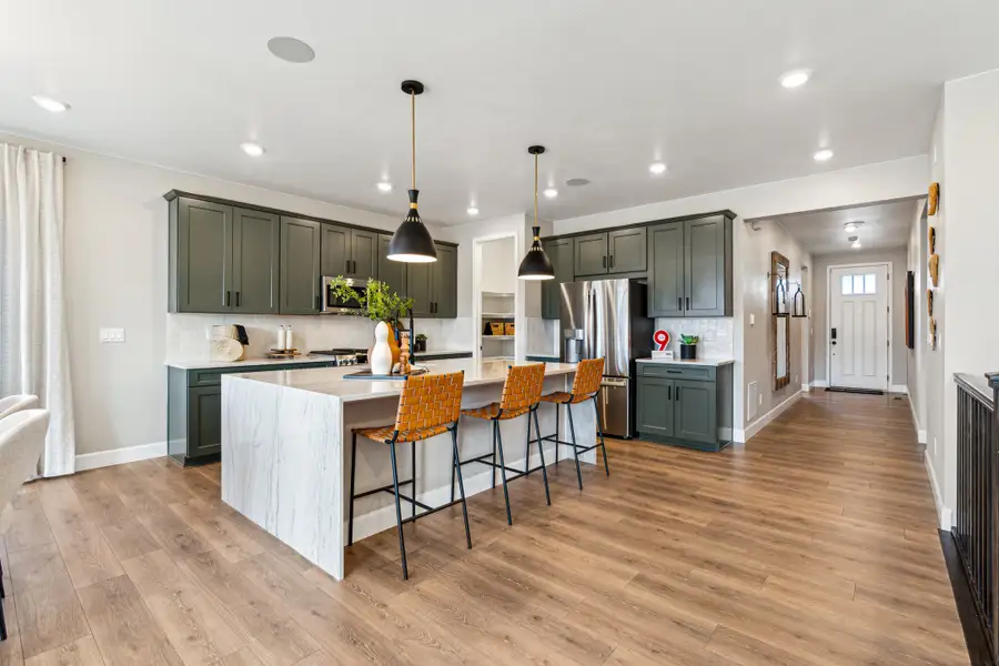 Furnished interior view inside a new home in Trailstone, Arvada (Image 11).