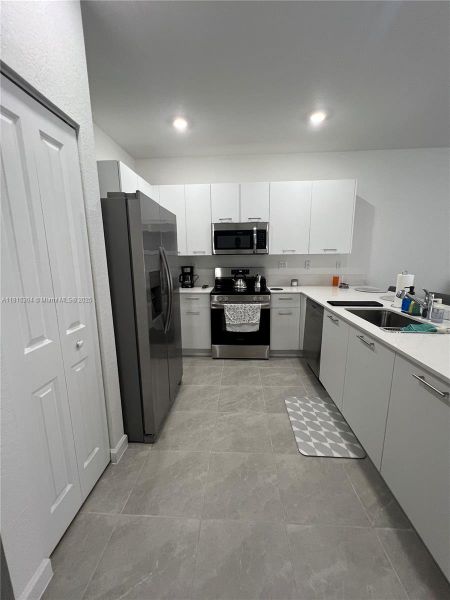 Furnished interior view inside a new home in , Miami Gardens (Image 6).