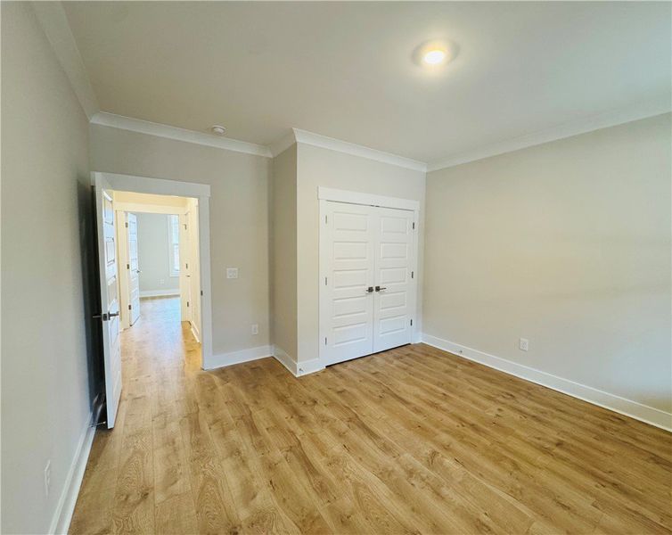 This spacious room features elegant crown molding