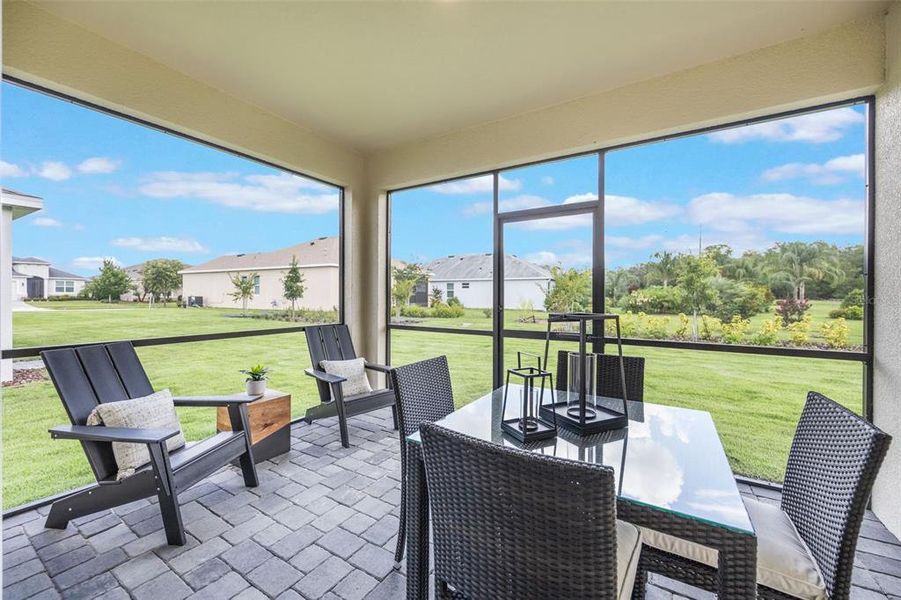 Exterior details and patio area of a home in Lakes of Mount Dora, Mount Dora (Image 2).