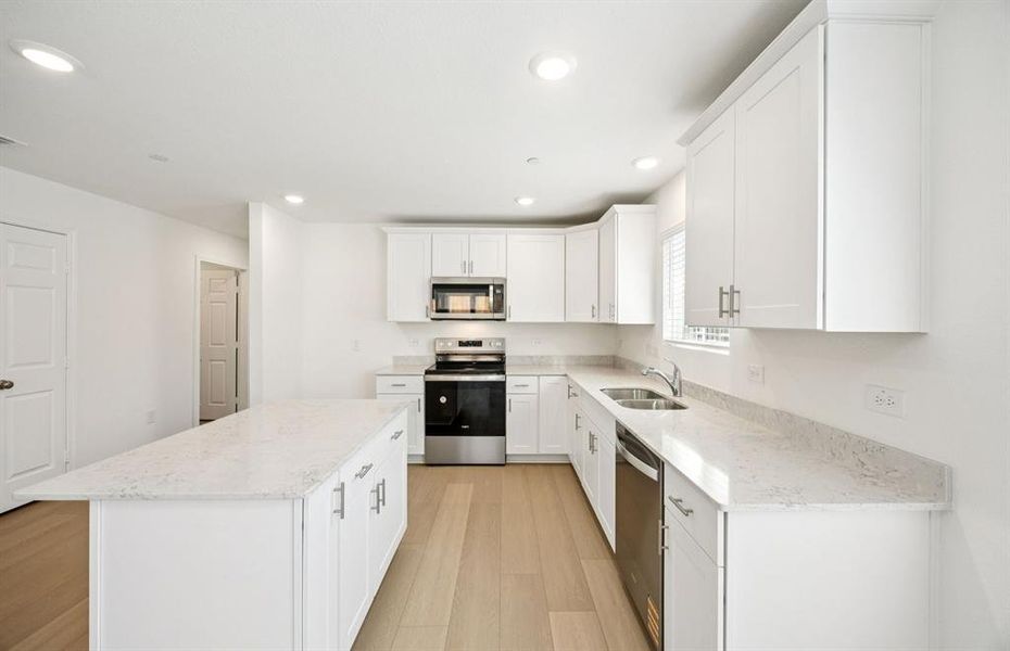 Airy kitchen with ample cabinet space Airy kitchen with ample cabinet space