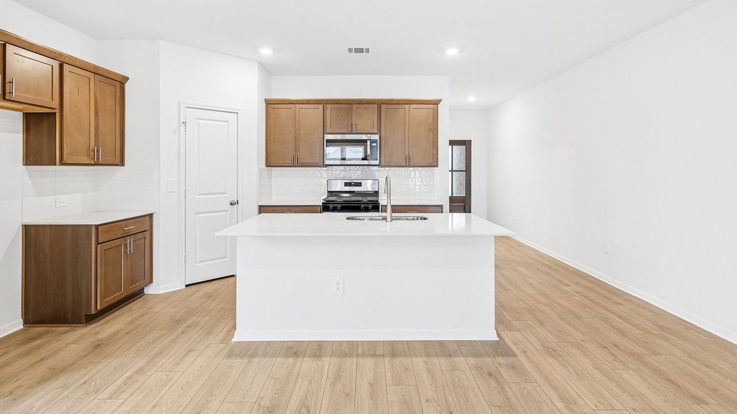 Furnished interior view inside a new home in Bar W Ranch, Leander (Image 9).
