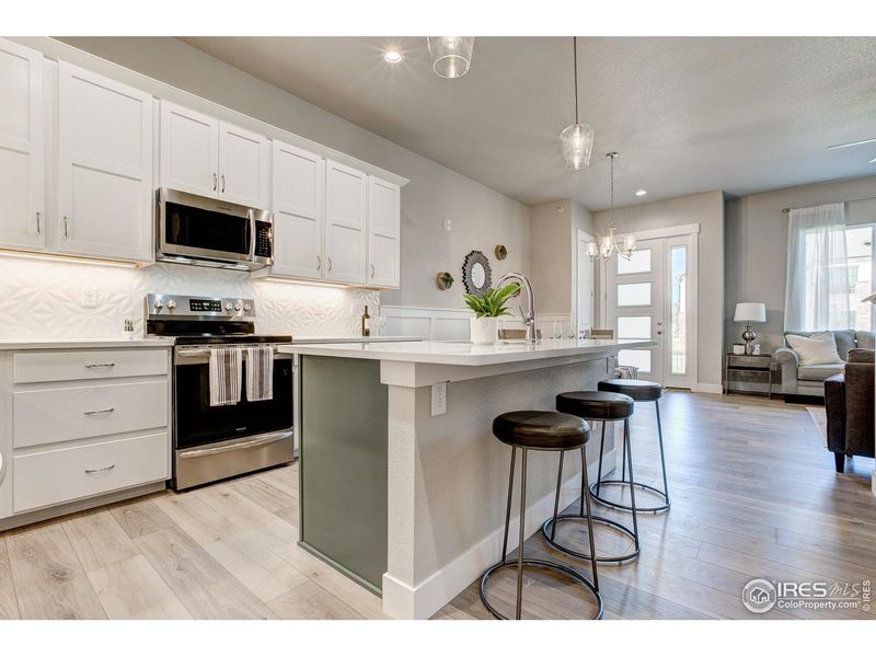 Furnished interior view inside a new home in Highlands at Fox Hill - The Towns, Longmont (Image 13).