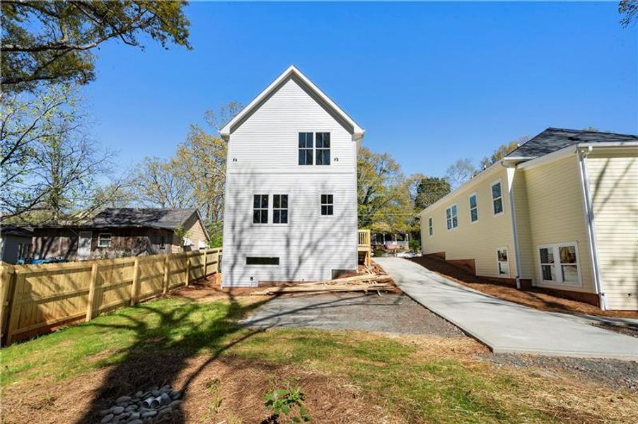 Front exterior of a new home in , Atlanta, GA, highlighting curb appeal (Image 26).