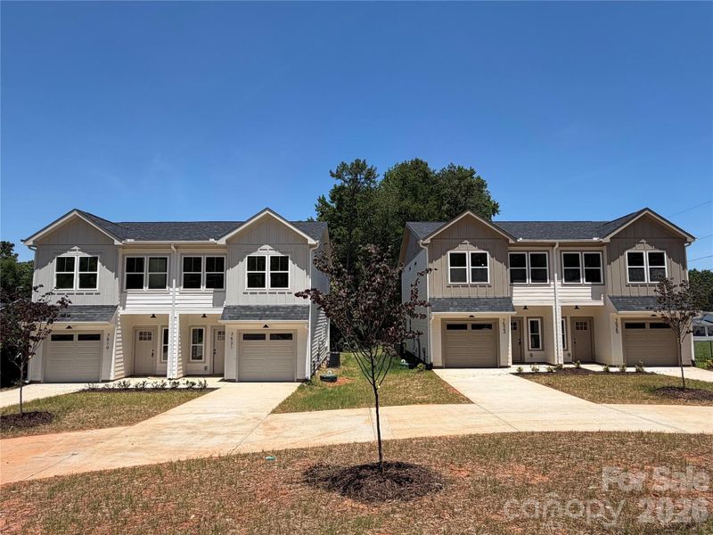 Front exterior of a new home in , Charlotte, NC, highlighting curb appeal (Image 23).