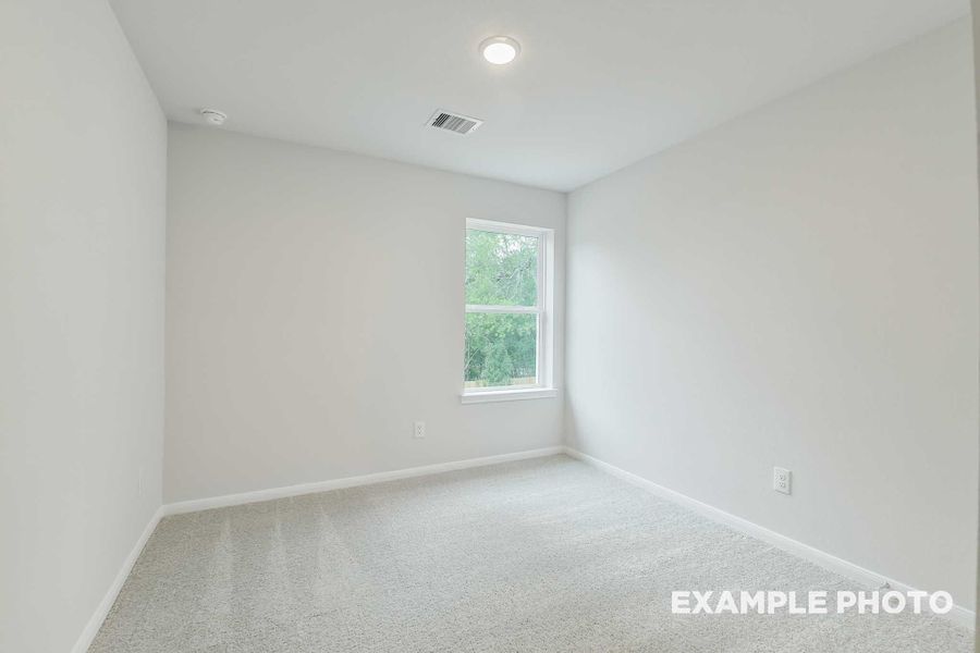Spacious, unfurnished interior of a new home in Caney Creek Place, Conroe (Image 25).