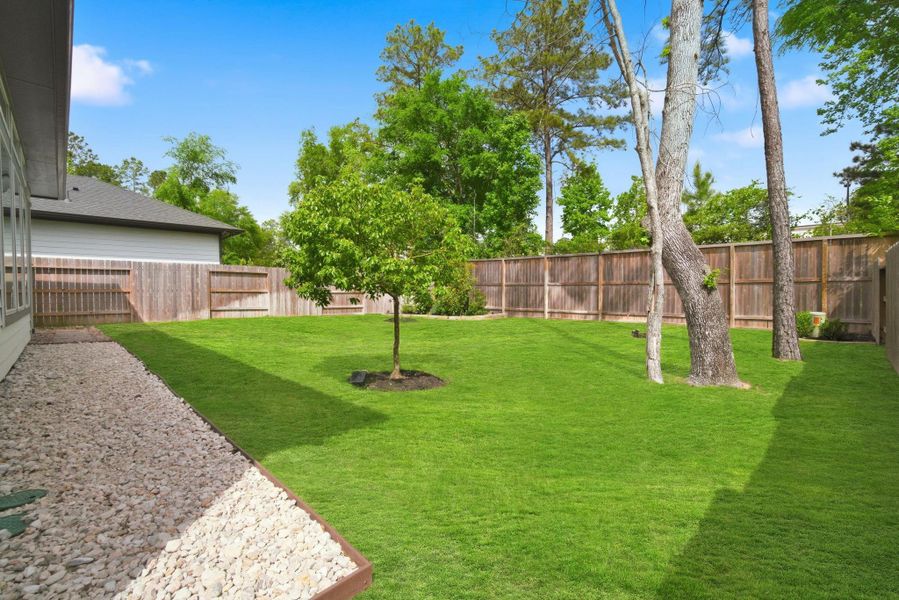 Exterior details and patio area of a home in Woodforest - Kingsley Square 50' Homesites, Montgomery (Image 22).
