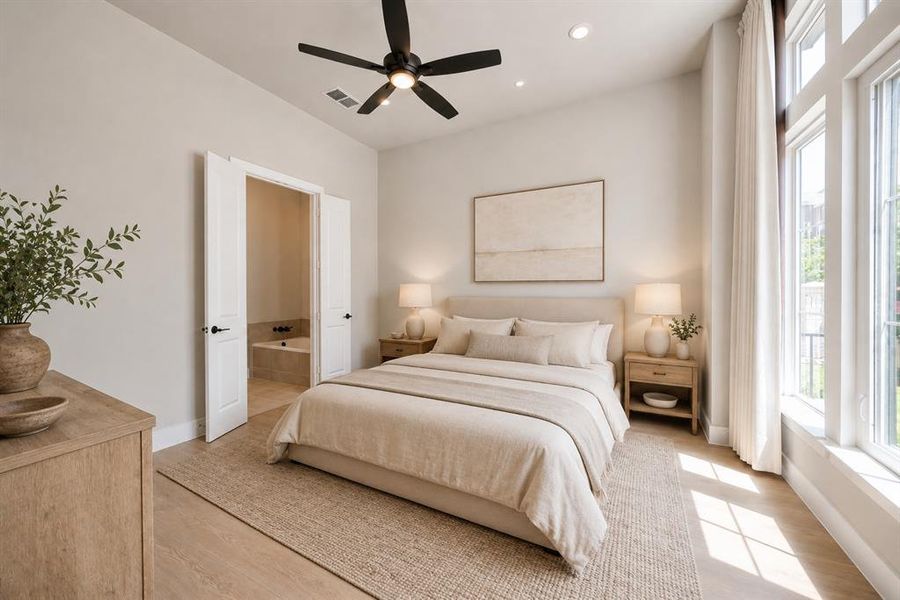 Spacious bedroom featuring wood-finish flooring, a contemporary ceiling fan, recessed lighting, and expansive windows