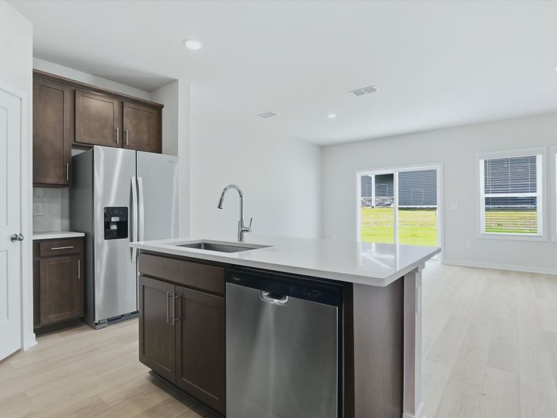 Furnished interior view inside a new home in Oakwood Townes, Mebane (Image 4).