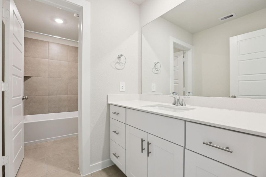 Furnished interior view inside a new home in Pine Lake Cove - Premier Series, Montgomery (Image 12).