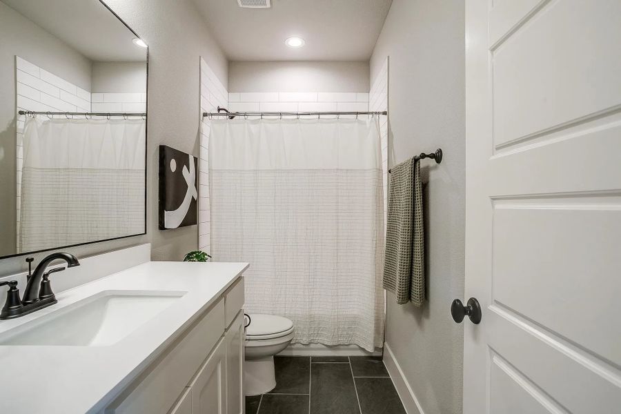 Representative furnished interior of a home built from the The Blaire by Elmwood Custom Homes in Matthews Farm, Venus (Image 29).