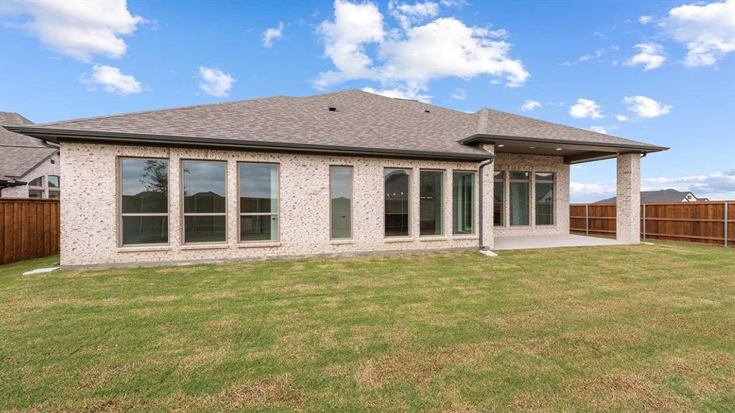 Exterior details and patio area of a home in Myrtle Creek 71', Waxahachie (Image 2).