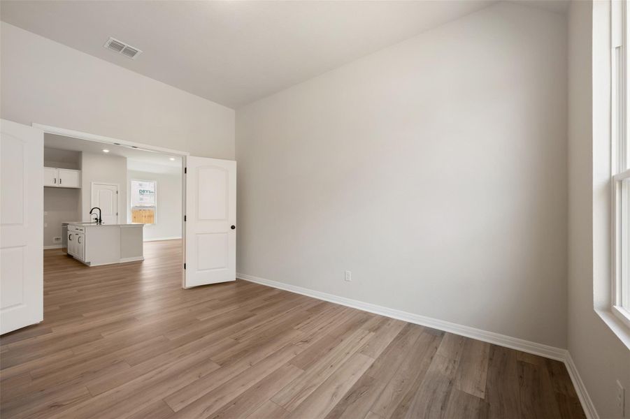 Spacious, unfurnished interior of a new home in The Colony, Bastrop (Image 28).