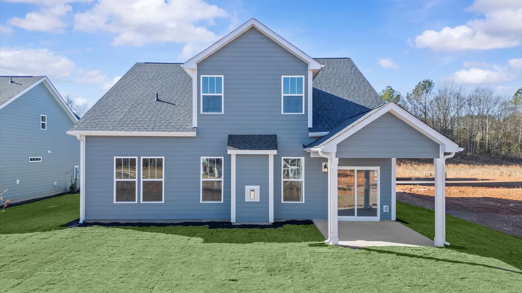 Exclusive rear covered porch with accomplished detail and elevated outdoor living potential