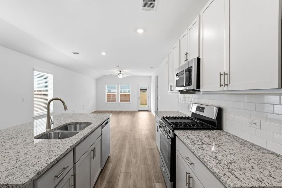 Furnished interior view inside a new home in Longview, Del Valle (Image 7).