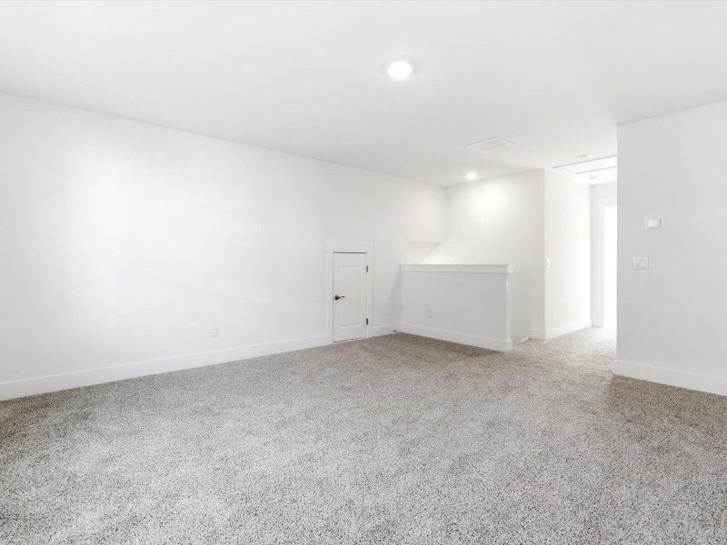 Spacious, unfurnished interior of a new home in The Coves at Lakes of Cane Bay, Summerville (Image 35). Spacious, unfurnished interior of a new home in The Coves at Lakes of Cane Bay, Summerville (Image 35).
