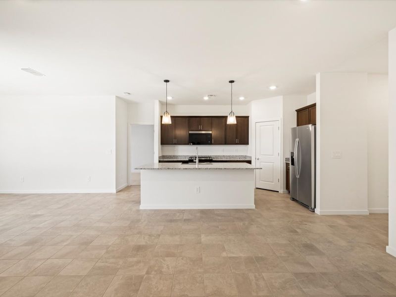 Spacious, unfurnished interior of a new home in Rancho Mirage Estate Series, Maricopa (Image 8).