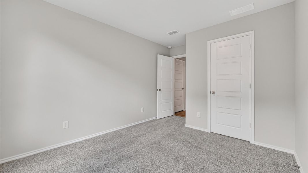 Representative unfurnished interior of a home built from the Bailey by D.R. Horton in Sunnycreek, Crowley (Image 34).