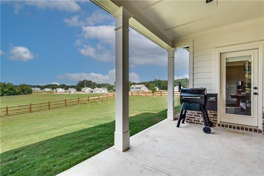 Exterior details and patio area of a home in Alcovy Station, Covington (Image 25).