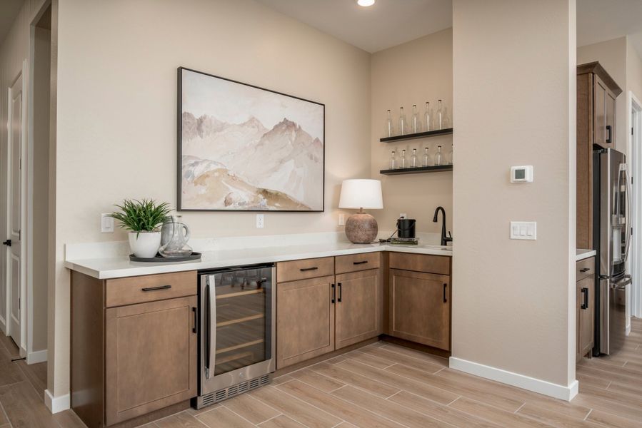 Representative furnished interior of a home built from the Falcon by Risewell Homes in Citrus Park, Goodyear (Image 18).