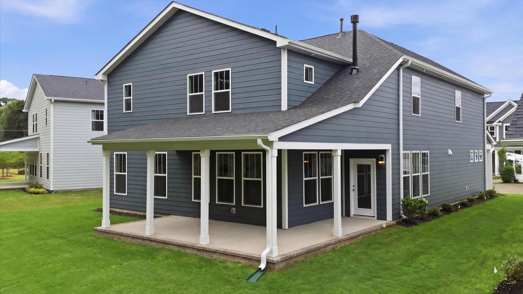 Notable exterior includes a rear covered porch designed for year-round enjoyment