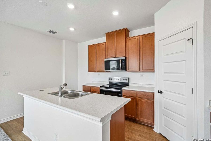 Furnished interior view inside a new home in The Granary - Heritage Collection, San Antonio (Image 5).