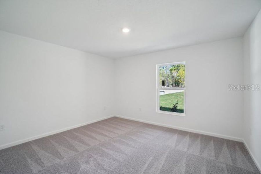 Spacious, unfurnished interior of a new home in Royal Highlands, Weeki Wachee (Image 20).