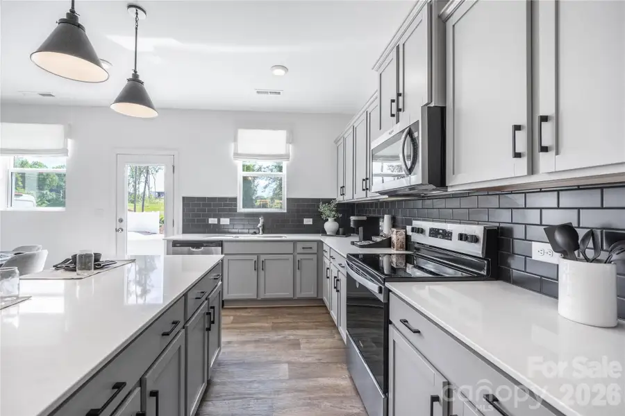 Furnished interior view inside a new home in Dukes Ridge, Charlotte (Image 6).